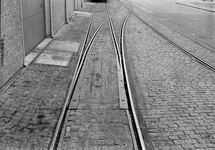 836118 Afbeelding van een wissel voor straatspoor in het oostelijke havengebied te Amsterdam.